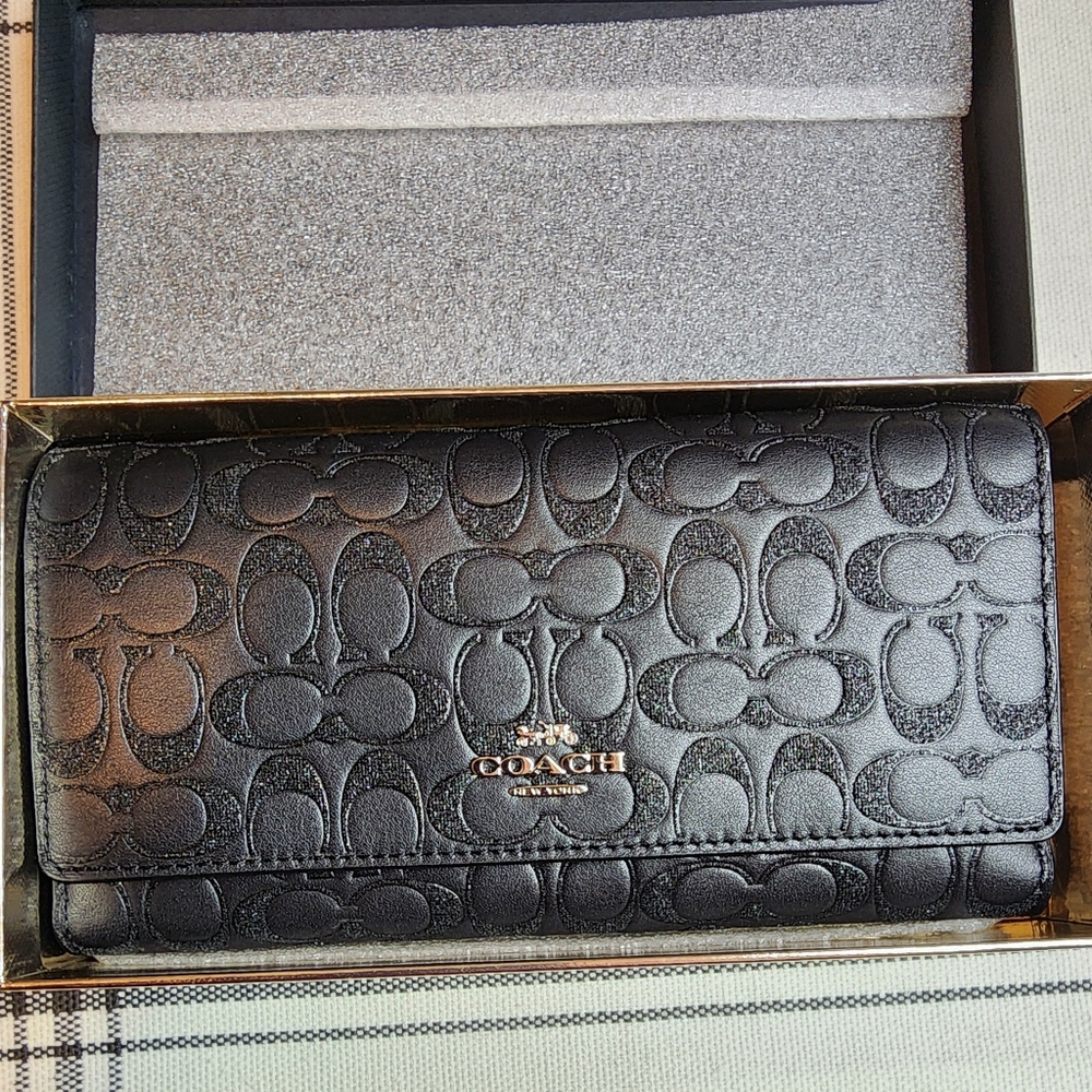Coach black tri-fold wallet glittery in gift box.